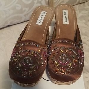 Steve madden wood clogs.